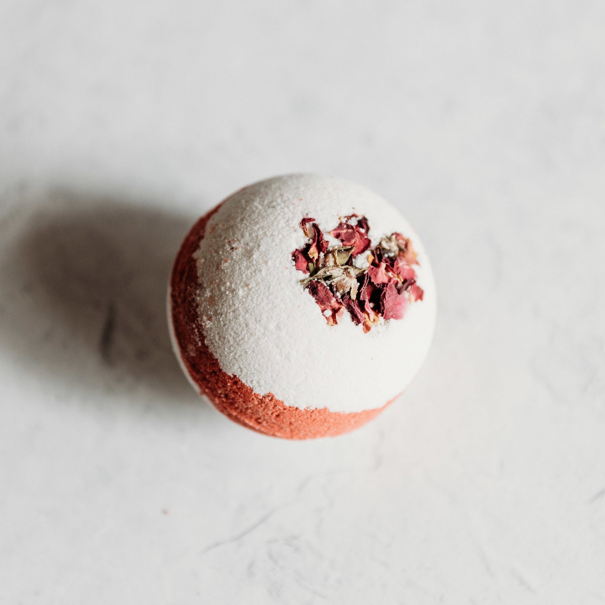 Enchanted Rose: This bath bomb is handmade with real Moroccan Rose petals, and contains natural antioxidants and oils to keep you skin feeling smooth.